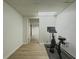 Basement exercise room with doorway to connecting rooms at 458 Valley Woods Se Cir, Conyers, GA 30094