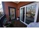Private balcony with wood flooring and a view of the surrounding neighborhood at 525 Parkway Ne Dr # 103, Atlanta, GA 30308