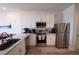 Modern kitchen featuring stainless appliances, light countertops and white cabinetry at 525 Parkway Ne Dr # 103, Atlanta, GA 30308