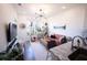 Open concept living room featuring light-filled spaces, modern decor and hard wood flooring at 525 Parkway Ne Dr # 103, Atlanta, GA 30308