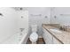Bathroom featuring combination tub/shower, toilet and single sink vanity at 5415 Orly Ter, Atlanta, GA 30349