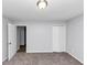 Cozy bedroom featuring neutral paint, carpeted floors and closet at 5415 Orly Ter, Atlanta, GA 30349