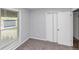 Cozy bedroom with a window and a closet at 5415 Orly Ter, Atlanta, GA 30349