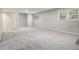 This is a finished basement with carpeting at 2544 Peyton Woods Sw Trl, Atlanta, GA 30311