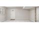 Unfinished basement features large open area with door to outside at 2544 Peyton Woods Sw Trl, Atlanta, GA 30311