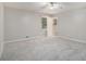 Spacious bedroom featuring neutral tones, plush carpeting, and ample natural light at 2544 Peyton Woods Sw Trl, Atlanta, GA 30311