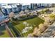 Enjoy a scenic aerial view of the pond, walkway and surrounding residences at 400 17Th Nw St # 1113, Atlanta, GA 30363