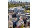 View of residences with manicured green space and downtown skyline at 400 17Th Nw St # 1113, Atlanta, GA 30363