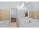 Bathroom with a dual sink vanity and soaking tub at 400 17Th Nw St # 1113, Atlanta, GA 30363