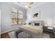 Comfortable bedroom with natural light, ceiling fan, and neutral decor at 400 17Th Nw St # 1113, Atlanta, GA 30363