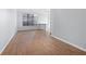 Bright, empty living room featuring tile flooring and a bar top at 400 17Th Nw St # 1113, Atlanta, GA 30363