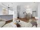 Open-concept living room with abundant natural light and views into the dining area and kitchen at 400 17Th Nw St # 1113, Atlanta, GA 30363