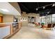 The welcoming lobby features a stone accent wall, seating area, and stylish reception desk at 400 17Th Nw St # 1113, Atlanta, GA 30363