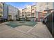 Community pool with a safety cover surrounded by modern condominiums at 400 17Th Nw St # 1113, Atlanta, GA 30363