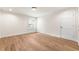 Empty bedroom with hardwood floors and shuttered window ready for customization at 1 Mooregate Sq, Atlanta, GA 30327