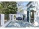 Charming backyard featuring a stone patio, manicured landscaping, and outdoor seating perfect for peaceful enjoyment at 1 Mooregate Sq, Atlanta, GA 30327