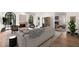 Bright living room with arched windows, fireplace, and hardwood floors creating an inviting atmosphere at 1 Mooregate Sq, Atlanta, GA 30327