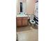 Standard bathroom featuring a single sink vanity and toilet with a patterned shower curtain at 116 Ventura Trl, Stockbridge, GA 30281