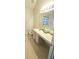 The bathroom features a vanity with a sink and cabinet storage, plus a mirror and nearby toilet at 116 Ventura Trl, Stockbridge, GA 30281
