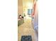 Spacious hallway welcomes with neutral carpeting, leading to sunlit rooms and promising a comfortable, inviting atmosphere at 116 Ventura Trl, Stockbridge, GA 30281