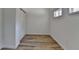 Empty bedroom showcasing hardwood flooring and closet at 4756 Fellsridge Dr, Stone Mountain, GA 30083