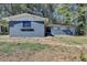 Charming single-story home with a blue brick exterior and a well-maintained front yard at 4756 Fellsridge Dr, Stone Mountain, GA 30083