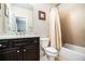 Bathroom showcasing vanity with marble countertop, and shower and tub combination at 100 Marietta Walk Trce, Marietta, GA 30064