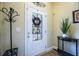 Bright entryway featuring a white door, stylish decor, and neutral walls at 100 Marietta Walk Trce, Marietta, GA 30064