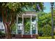 Charming gazebo in a lush town square featuring decorative columns and landscaping, perfect for community gatherings and relaxation at 100 Marietta Walk Trce, Marietta, GA 30064