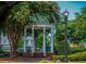 Charming gazebo in a lush town square featuring decorative columns and landscaping, perfect for community gatherings and relaxation at 100 Marietta Walk Trce, Marietta, GA 30064