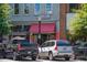 Inviting ice cream shop exterior with a red awning, perfect for enjoying a sweet treat in the heart of the town at 100 Marietta Walk Trce, Marietta, GA 30064