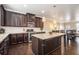 Contemporary kitchen featuring a center island, granite countertops, and ample cabinetry at 100 Marietta Walk Trce, Marietta, GA 30064