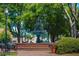 Picturesque park featuring a tiered fountain, benches, and well-manicured greenery for a peaceful retreat at 100 Marietta Walk Trce, Marietta, GA 30064