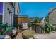 Cozy patio area perfect for outdoor relaxation, with comfortable seating and lush greenery at 100 Marietta Walk Trce, Marietta, GA 30064