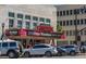The historic Strand Theatre featuring its bright marquee showcasing local events and entertainment in the heart of downtown at 100 Marietta Walk Trce, Marietta, GA 30064