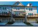 Stylish townhomes with private balconies and attached garages, designed for comfortable living and outdoor enjoyment at 100 Marietta Walk Trce, Marietta, GA 30064