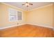 This empty bedroom has hardwood floors and natural light from the window at 1181 Angelia Sw Dr, Mableton, GA 30126