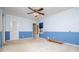 Bedroom featuring two-tone walls and a classic ceiling fan at 1181 Angelia Sw Dr, Mableton, GA 30126