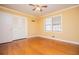Bedroom features hardwood floors, natural light, and closet space at 1181 Angelia Sw Dr, Mableton, GA 30126
