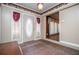 Welcoming foyer features tiled floors, decorative details, and a glimpse into the adjacent living spaces at 1181 Angelia Sw Dr, Mableton, GA 30126