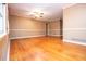 Bright living room showcasing hardwood floors, classic trim, and a ceiling fan at 1181 Angelia Sw Dr, Mableton, GA 30126