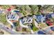 Aerial view of the home, pool, and surrounding neighborhood showcasing location and community amenities at 1562 Asheforde Dr, Marietta, GA 30068