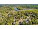 Aerial view of a beautiful neighborhood nestled in a green area near a lake at 1562 Asheforde Dr, Marietta, GA 30068