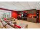Basement living room with comfortable seating, built-in cabinets, and large windows at 1562 Asheforde Dr, Marietta, GA 30068