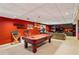 Basement game room including a pool table, ping pong, and couches at 1562 Asheforde Dr, Marietta, GA 30068