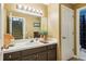 Neutral bathroom with a large mirror over the sink and a walk-in shower at 1562 Asheforde Dr, Marietta, GA 30068