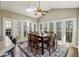 Sunlit dining area with vaulted ceilings, skylight, windows and hardwood floors at 1562 Asheforde Dr, Marietta, GA 30068