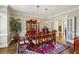 Formal dining room featuring hardwood floors and classic furniture at 1562 Asheforde Dr, Marietta, GA 30068
