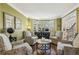 Comfortable living room with bay window and matching chairs at 1562 Asheforde Dr, Marietta, GA 30068