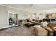 Open-concept living room with views into a seating area, the kitchen and breakfast bar at 1562 Asheforde Dr, Marietta, GA 30068